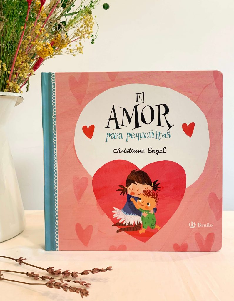 Portada del libro en el que, dentro de un corazón, aparecen dos niños abrazándose