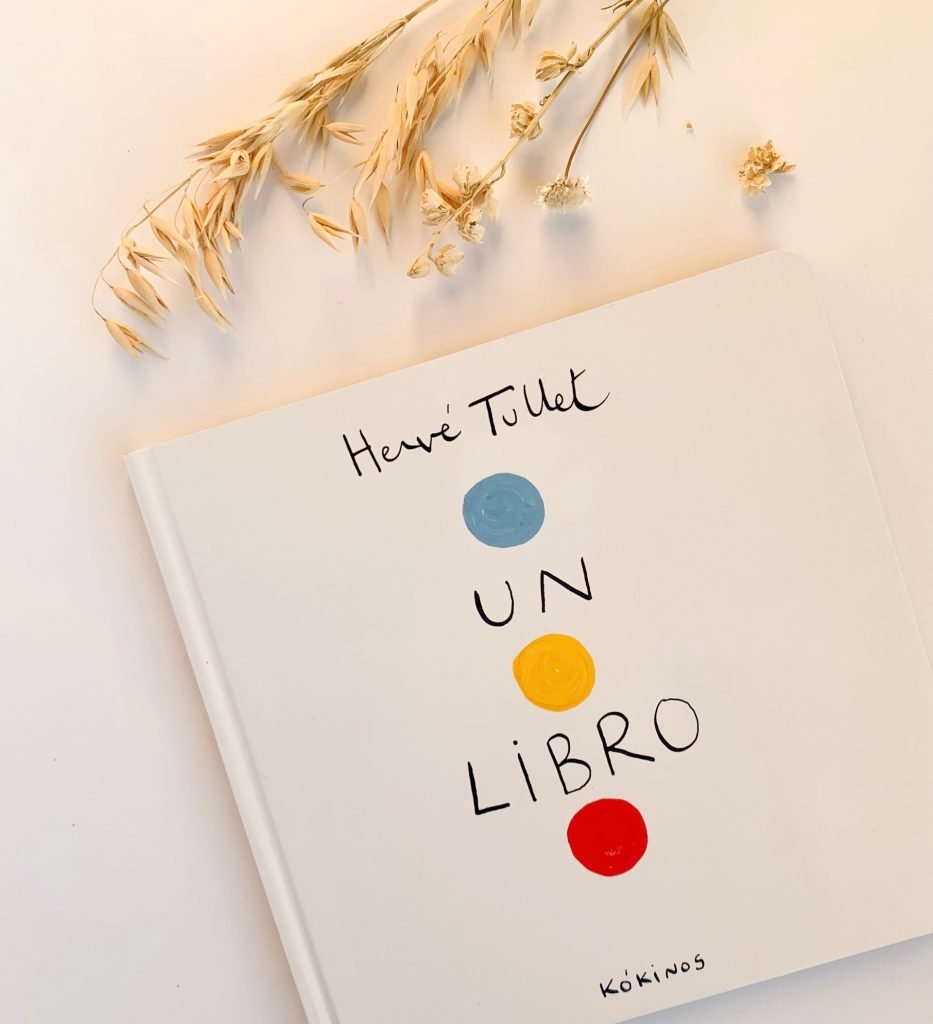 portada del libro en el que aparecen tres círculos de color azul, rojo y amarillo